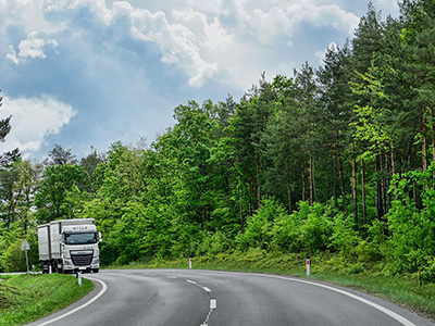 Truck on the road to the solar power plant